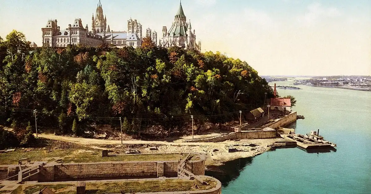 Historic view of the Parliament buildings in Ottawa seen across the river from Major Hill Park