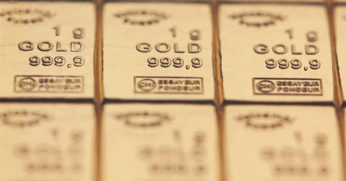 Stacked gold bars on a table