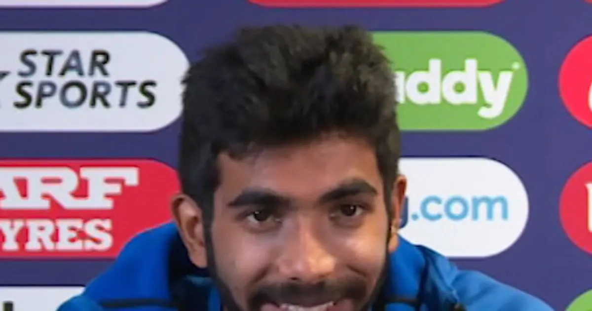Jasprit Bumrah in India blue kit during a press appearance