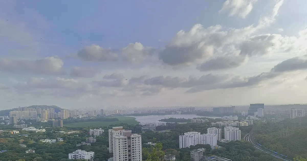 Hillside city view overlooking dense urban buildings