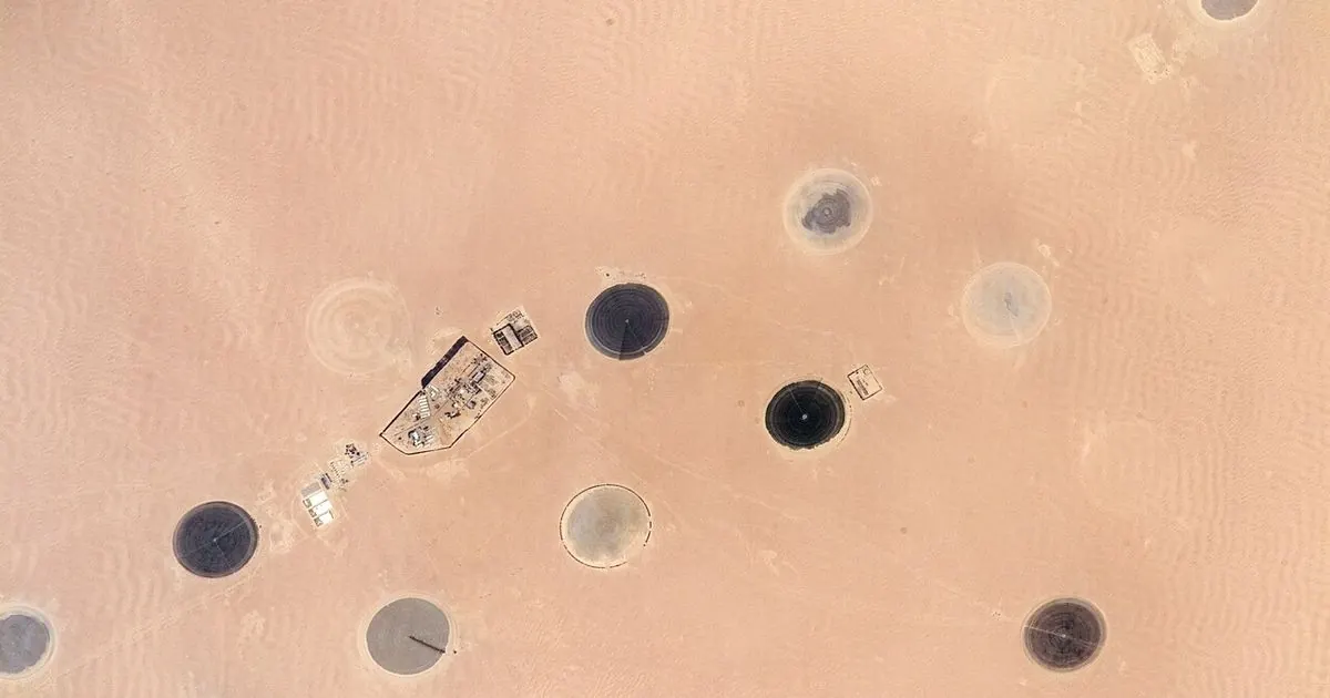 Circular center-pivot irrigated fields in the Libyan Desert, seen from the International Space Station