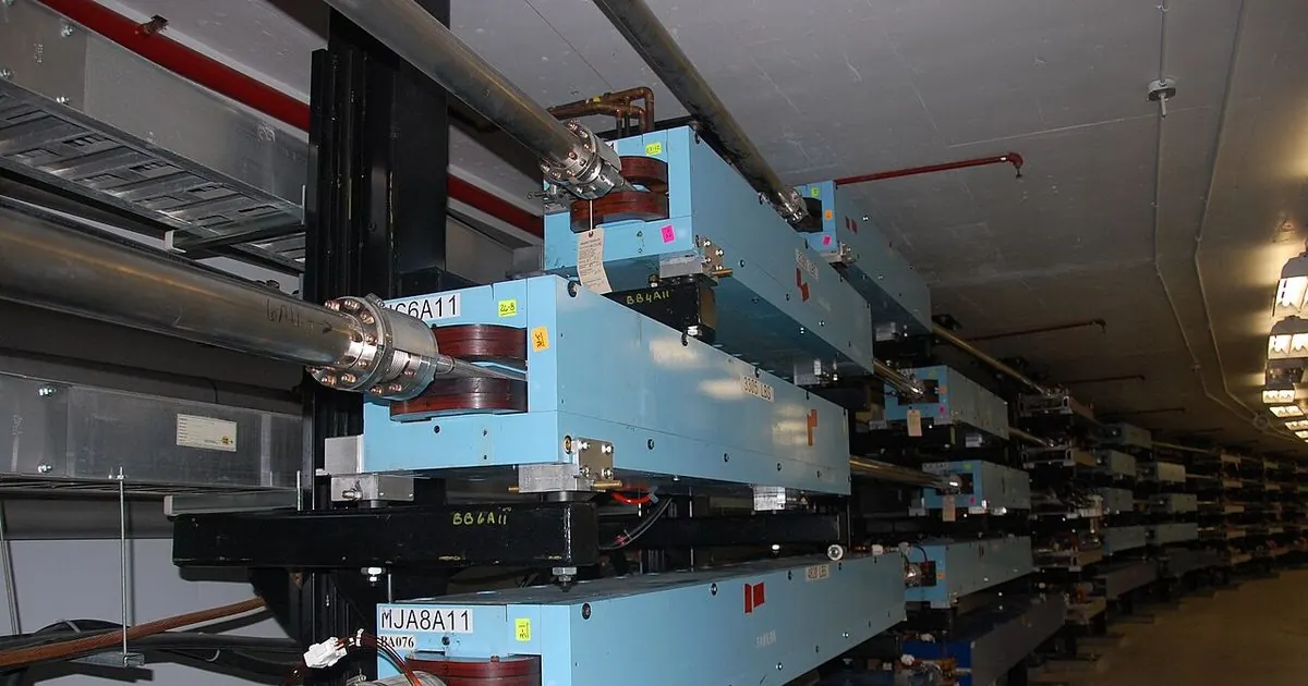 Rows of blue electromagnets along a particle accelerator beam line at a U.S. Department of Energy laboratory
