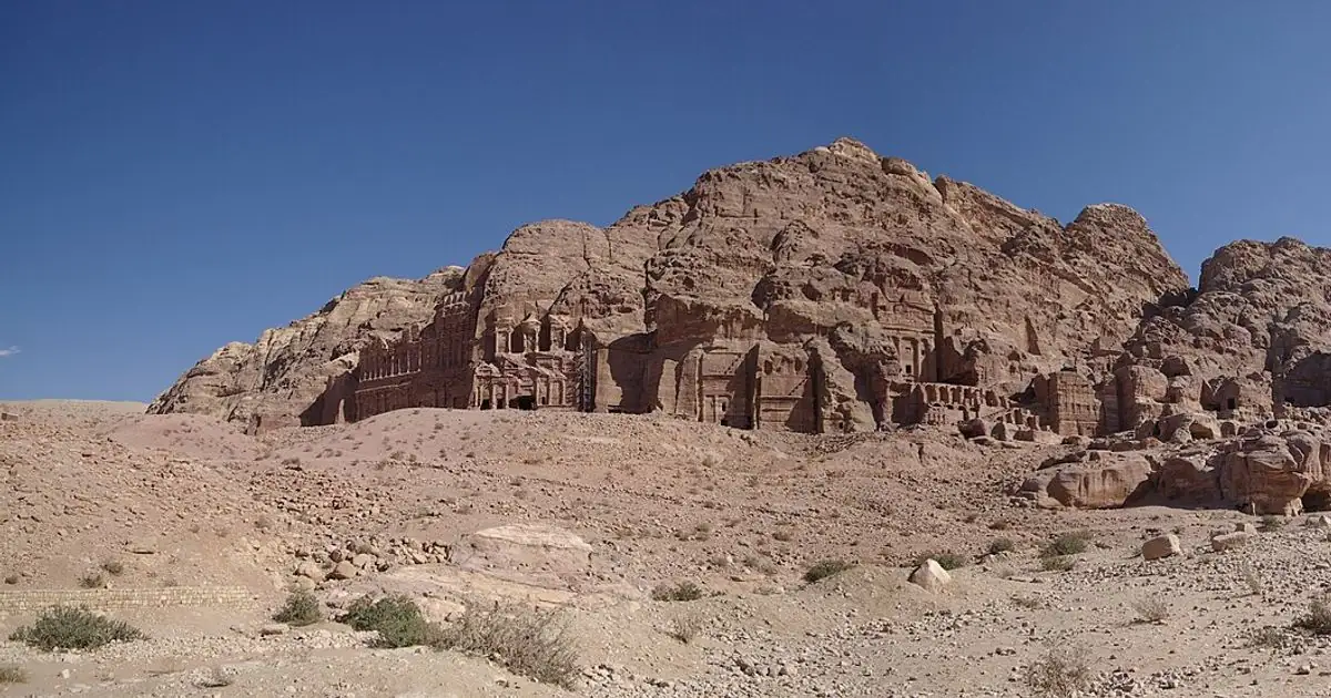 Rock-cut facades and cliffs at ancient Petra in Jordan