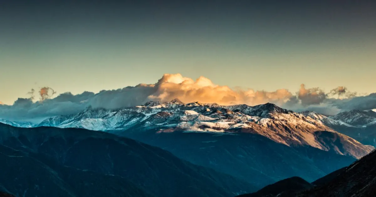 Snowy mountain peaks under a clear blue sky
