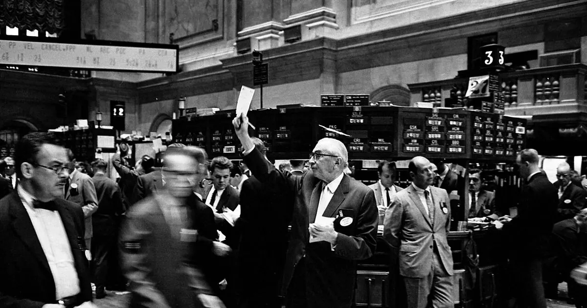 Traders working on the New York Stock Exchange floor