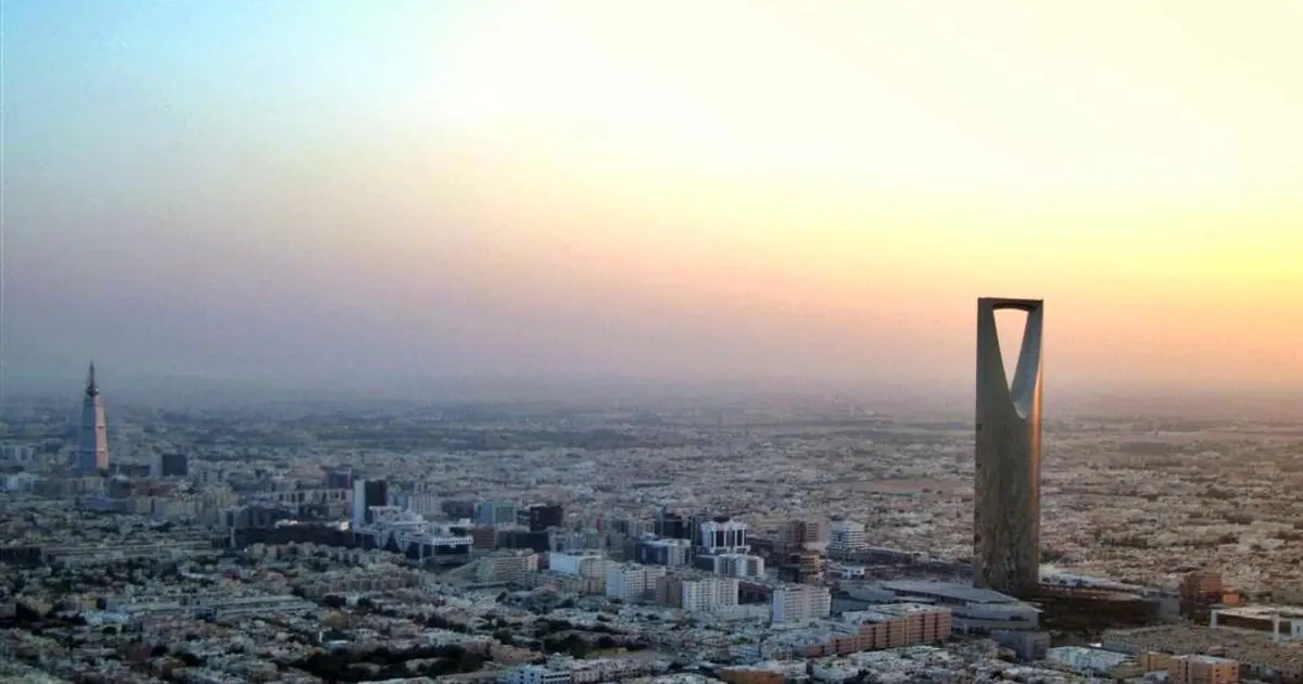 Aerial view of Riyadh skyline with Kingdom Centre tower at dusk