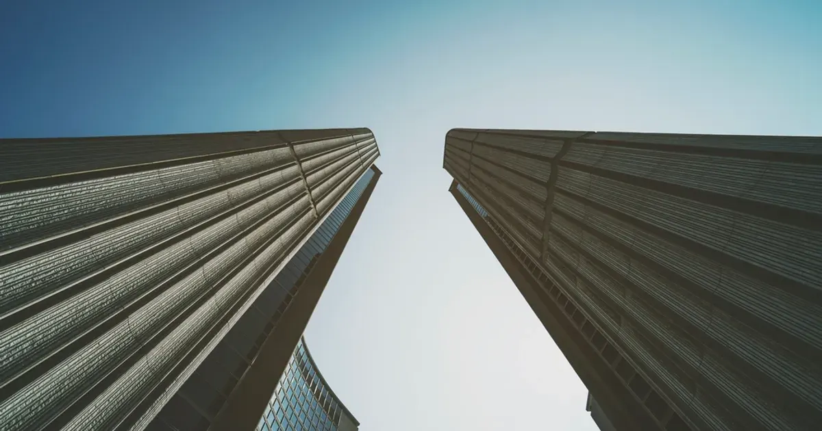 Curved towers of Toronto City Hall against the sky