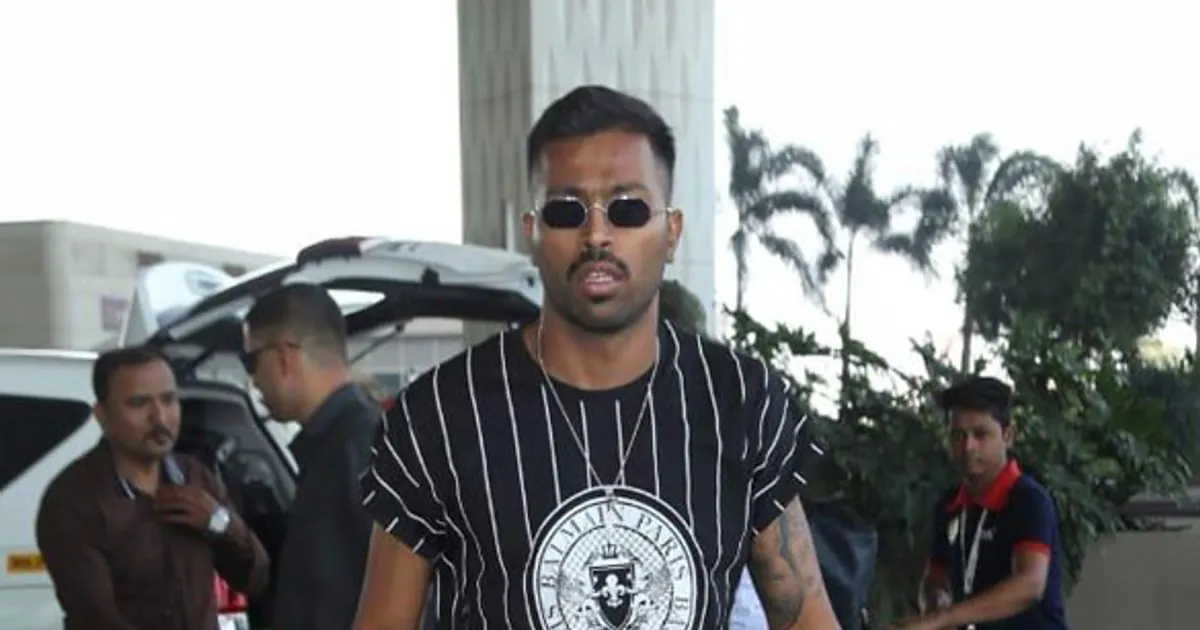 Hardik Pandya walking outdoors in casual clothes