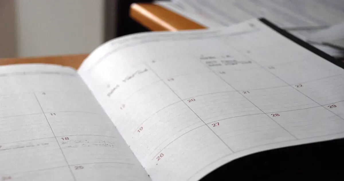 Open paper calendar for planning dates