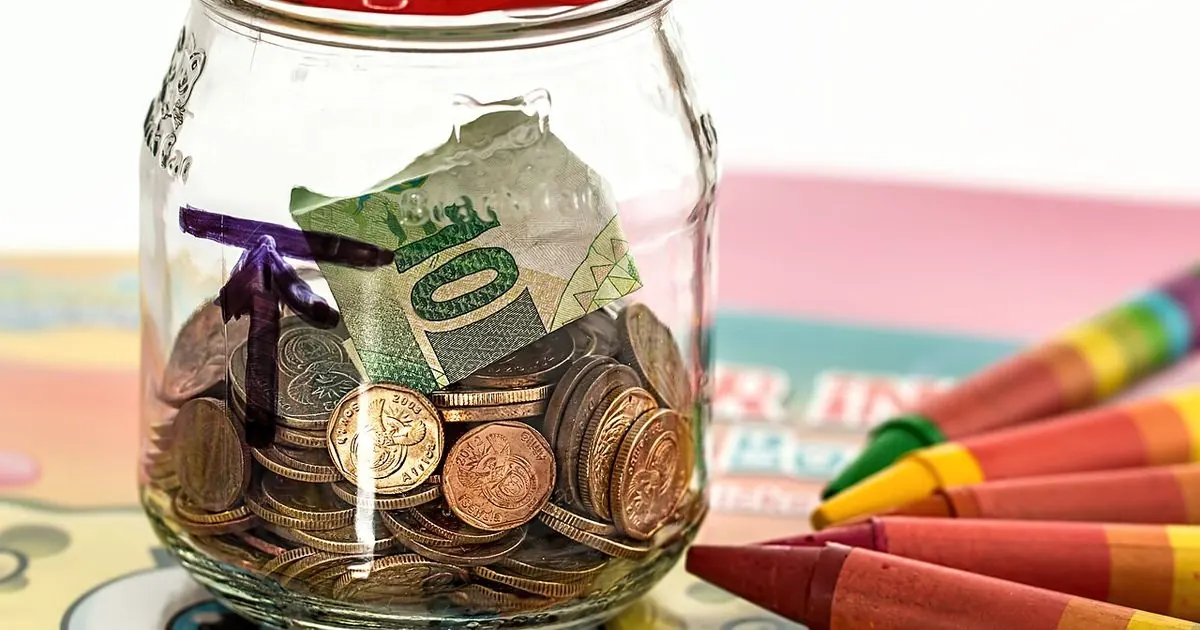 Pink ceramic piggy bank used for saving cash