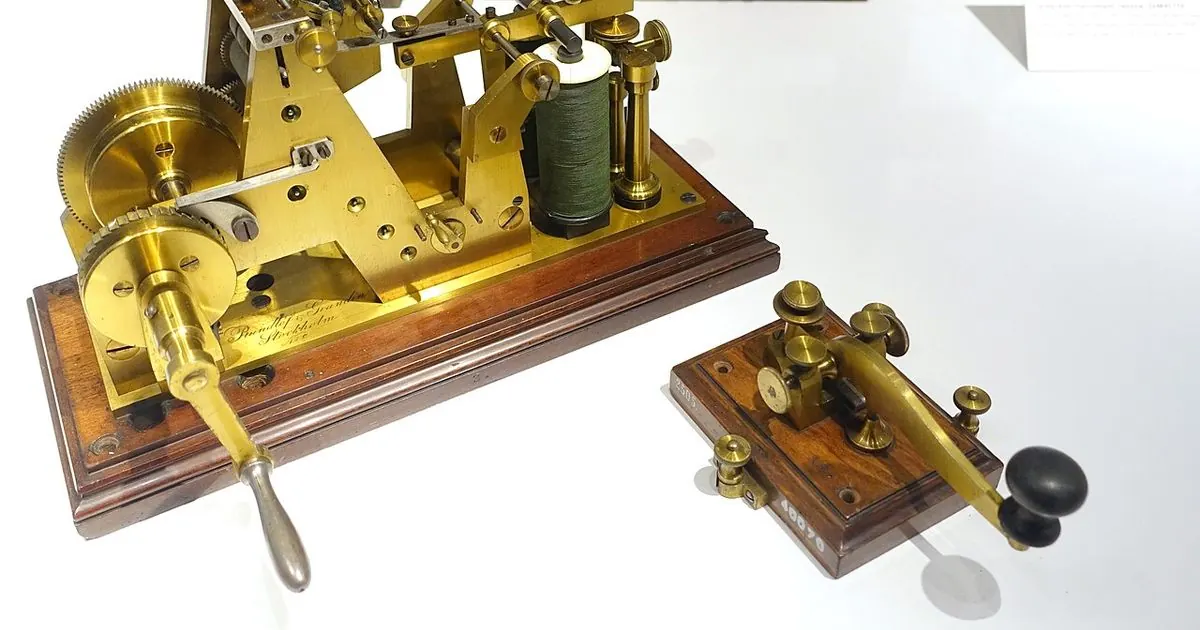 Historic Morse telegraph printer and key on display