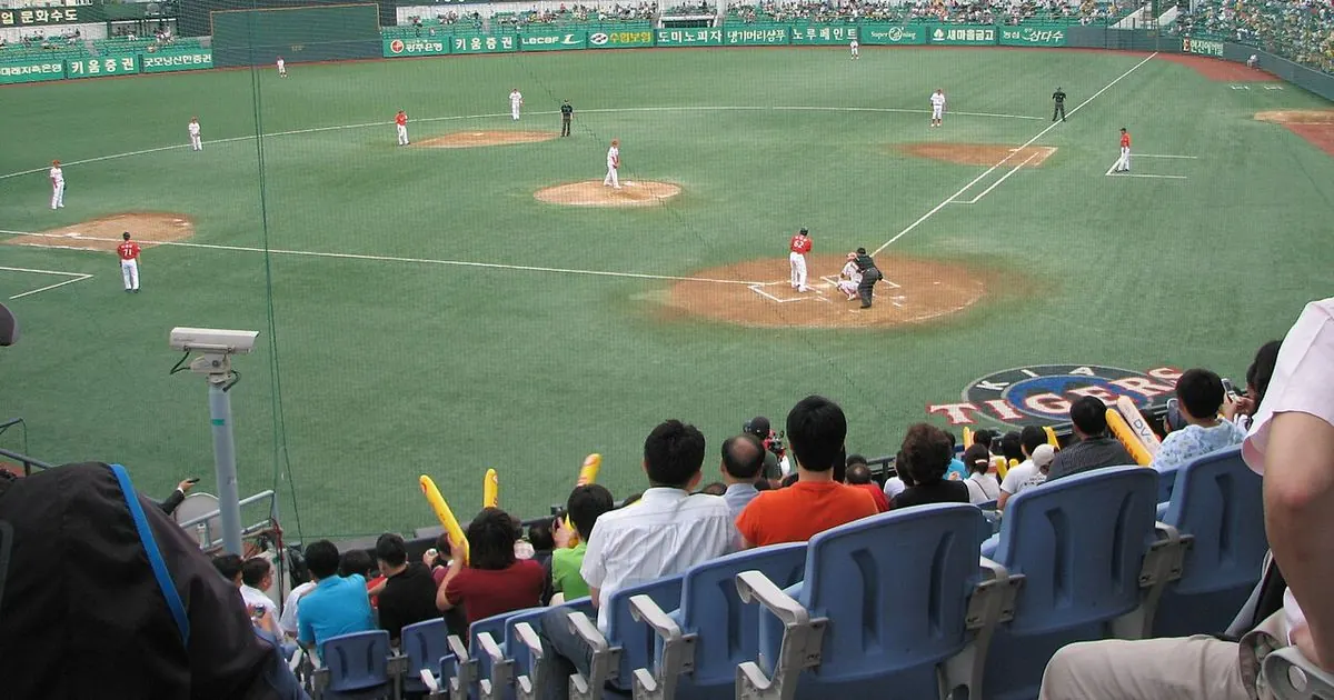 Baseball stadium field under night lights
