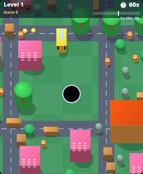 Hungry Hole gameplay: a black hole on green grass next to roads, crates, cones and a car in a toy town